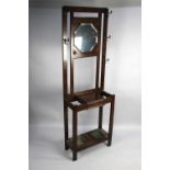 An Edwardian Oak Narrow Hall Stand with Centre Glove Box Having Hinged Lid, Two Metal Drop Trays and