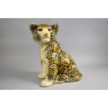 A Mid 20th Century Plaster Study of a Seated Leopard Cub, 38cms High
