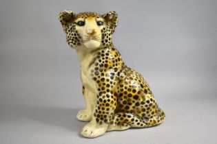 A Mid 20th Century Plaster Study of a Seated Leopard Cub, 38cms High