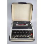 A Vintage Cased Olivetti Lettera DL Manual Portable Typewriter in Carrying Case