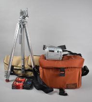 A Canon MV600 Digital Video Camcorder, Tapes and a Tripod, Both in Carrying Bags