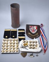 A Collection of Various Militaria to include Buttons, Badges, Shell Case, D Day Landings Anniversary