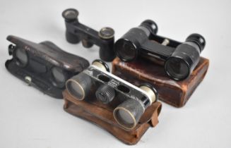 A Collection of Four Vintage Pocket Binoculars, Three with Cases