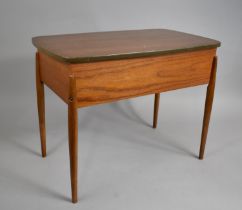 A 1970s Teak Lift Top Rectangular Sewing Box on Turned Supports, 57cms Wide