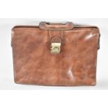 A Late 20th Century Fitted Leather Briefcase, 43cms Wide With Key Inside.