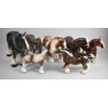 A Collection of Various Glazed Heavy Horse Figures