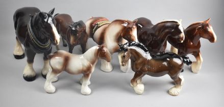 A Collection of Various Glazed Heavy Horse Figures