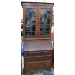A Mid 20th Century Bureau Bookcase with Pull Down Front to Fitted Interior over Three Long