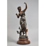 A French Bronzed Spelter Figure 'Printemps', Circular Wooden Faux Marble Base, Loss to Fingers,