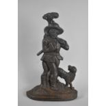 A Victorian Cast Metal Door Porter in the Form of Woodman with Axe and Dog by His Side, 36.5cms High