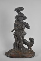 A Victorian Cast Metal Door Porter in the Form of Woodman with Axe and Dog by His Side, 36.5cms High