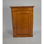 A Nice Quality Oak Wall Hanging Corner Cabinet with Panelled Door to Shelved Interior, 70cms Wide