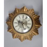 A Mid 20th Century Smith Sectric Starburst Clock, Working Order, 26cms Diameter