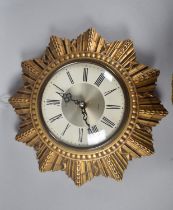 A Mid 20th Century Smith Sectric Starburst Clock, Working Order, 26cms Diameter