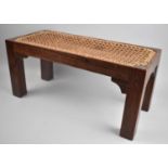 A Small Rectangular Rosewood Framed Stool with Caned Top, 45.5cms Wide