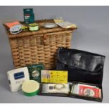 A Vintage Wicker Fishing Creel Containing Angling Accessories Such as Fishing Lines and Leaders,