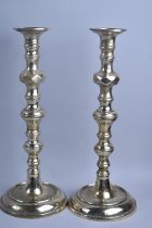 A Pair of Brass "King of Diamond" Style Candlesticks, Circular Bases with Engraved Decoration, 32cms