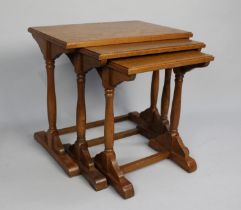 A Mid 20th Century Nest of Three Oak Tables, 50cms Wide, Turned Supports