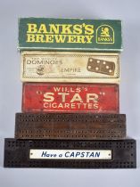 A Collection of Two Vintage Cribbage Boards and Three Boxed Sets of Advertising Dominoes