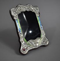 A Reproduction Art Nouveau Silver and Enamelled Photo Frame, 21.5cm high