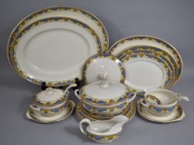 A Wilkinson Staffordshire Pottery Dinner Service to comprise Graduated Platters, Tureen, Plates Etc