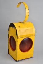 A Mid 20th Century Yellow Painted Road Lamp