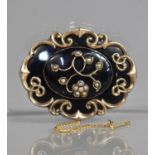 A Mid 19th Century Victorian Yellow Metal and Black Glass Mourning Brooch, of Oval Form with