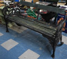 A Late 19th Century Cast Iron Ended and Wooden Slatted Garden Bench, Nouveau Design Featuring