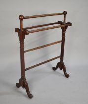 An Edwardian Mahogany Towel Rail with Reeded Supports, 67cms Wide