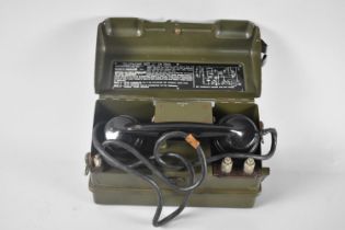 A Mid 20th Century Military Field Telephone Set 'J' Number YA7815 with War Department Crows Foot,