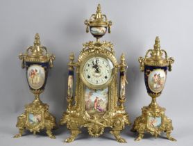 A French Brass and Porcelain Clock Garniture in the Sevres Style, Hand Painted Lozenge Decoration to