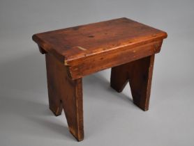 A Stained Pine Rustic Rectangular Topped Stool, 40cms by 23cms by 32cms High