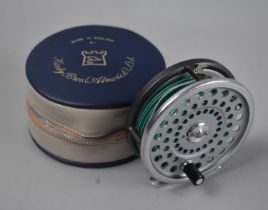 A Modern Hardy Marquis Fly Reel with Circular Carrying Case