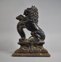 A 19th Century Cast Iron Door Porter in the Form of Lion Rampant, 38cms High