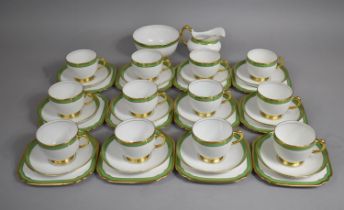 A Tuscan China Gilt and Green Trim Service to comprise Twelve Cups, Saucer and Side Plates, Milk Jug
