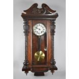 An Edwardian Vienna Style Wall Clock with Glass Reeded Pilaster Decoration, Glazed Pendulum Door and