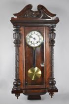 An Edwardian Vienna Style Wall Clock with Glass Reeded Pilaster Decoration, Glazed Pendulum Door and