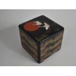 A Modern Oriental Three Tier Lacquered Food Box Decorated with Cranes and Fir Cones, 20cms Square