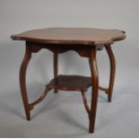 An Edwardian Mahogany Occasional Table with Stretcher Shelf, Cut Down