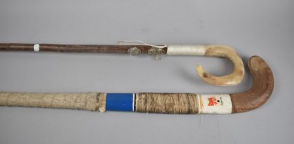 A 20th Century Horn Handled Shepherds Crook together with a Hockey Stick