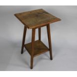 An Edwardian Oak Square Topped Occasional Table with Stretcher Shelf, 43cms Square