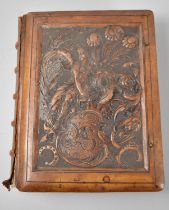 A Late 19th/Early 20th Century German Photograph Album with Front and Back Boards in Carved Wood,
