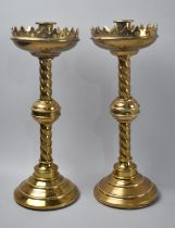 A pair of Late 19th Century Brass Ecclesiastic Candlesticks with Barley Twist Supports 34cms High