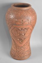 A Large Terracotta Vase of Waisted Form with Engraved Geometric Decoration, 40cm high
