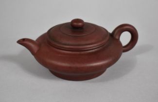 A Chinese Yixing Teapot of Squat Bellied Form with Loop Handle, Impressed mark to Base and Inner