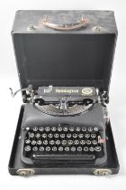 A Vintage Cased Remington Manual Portable Typewriter