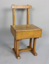 A Mid 20th Century Child's Chair with Hinged Lid to Box Seat