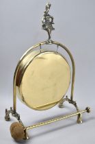 A Mid 20th Century Brass Table Gong with Dancing Girl Handle, 29cms High, Complete with Clapper