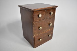 An Edwardian Miniature Collectors Chest, Perhaps an Apprentice Piece, in the Form of a Chest of