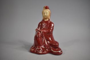 A Chinese Glazed Porcelain Study of Guanyin, Sang De Boeuf Glazed Over Blanc De Chine, Unglazed